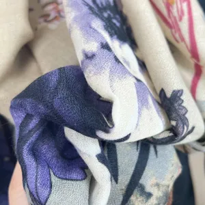 Cotton linen scarf detail close-up, retro ink painting floral pattern texture, soft fabric.