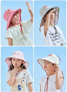 Kids sun protection hat detail showing wide brim, adjustable wind rope, and breathable mesh.
