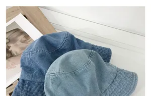 Denim bucket hat for men and women, wide brim sun hat, casual Japanese style streetwear.