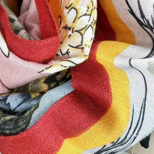 Detail of retro national style cotton linen scarf with ink bamboo pattern, artistic texture.