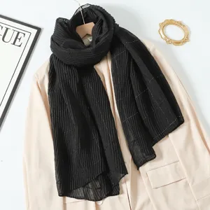 Black pleated scarf with silver threads, long wrap for women, elegant fashion accessory.