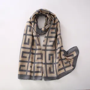 Geometric pattern scarf detail, soft cotton linen feel, stylish winter wrap shawl.