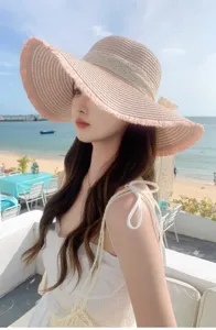 Japanese fringe straw hat with lace band and bow ribbon, perfect for beach vacation and summer sun.