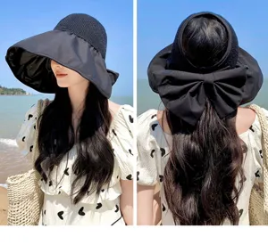 Black empty top wide brim sun hat with large bow ponytail design summer beach uv protection.