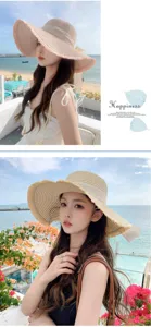 Detail view of a Japanese style fringed straw hat with ribbon bow for beach vacation women.