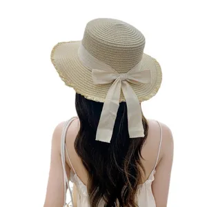 Japanese style frayed straw hat with sweet ribbon bow, elegant flat top beach sun hat for women.