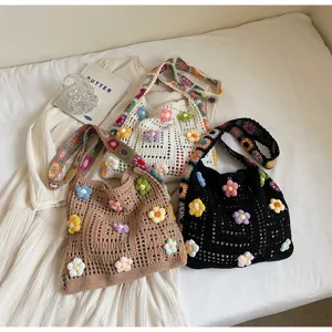 Handmade crochet tote bags with 3D colorful sunflower patterns in three neutral colors.
