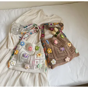 Handmade crochet tote bag with colorful sunflower floral pattern in white and brown