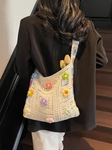 Bohemian style cream handmade crochet shoulder bag with colorful knitted sunflowers