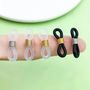 Vue détaillée des embouts de chaîne de lunettes en silicone avec spirale métallique, pièces.