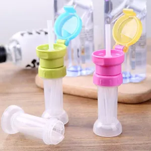Silicone bottle straw cap adapter for kids, anti-choking flip top design for water bottles.