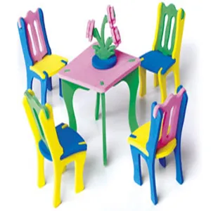 DIY 3D puzzle furniture model toy set including table, chairs and flower decor item.