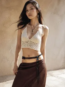 Handmade woven waist chain detail view showing bohemian style and intricate texture for resort wear.