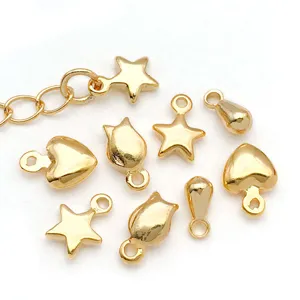 Colgantes de metal chapado en oro estrellas corazones accesorios de joyería DIY para pulsera