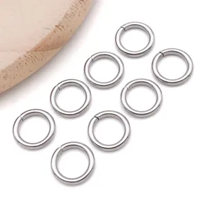 Close-up detail shot of silver stainless steel jump rings, ideal for DIY jewelry making.