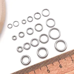 Stainless steel silver jump rings detail view for DIY jewelry making and bracelet accessories.