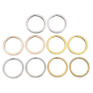 Multicolor alloy round split key rings set, flat layout display for DIY crafts and jewelry making.