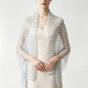 Exquisite silver sequin mesh shawl detail, elegant evening party dress wrap accessory.