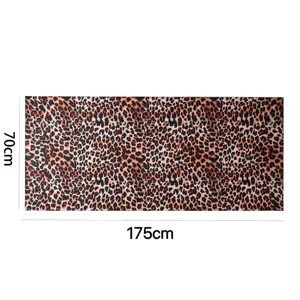 Leopard print satin polyester long scarf detailed view, soft texture, stylish fashion accessory.