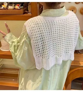 Detail shot of a white hollow knit fake collar shawl, perfect for layering in summer or spring.