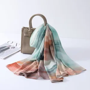Watercolor tie-dye satin polyester long scarf detail showing soft fabric texture and elegant drape.