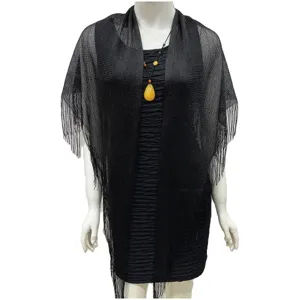Detailed view of the black metallic fringe shawl, showcasing hollow knit and elegant tassels.
