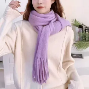Cozy solid color knitted tassel scarf for women, soft warm winter fashion neck warmer.