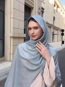 Light blue slub long scarf detail, breathable plain fabric shawl for casual daily outdoor wear.