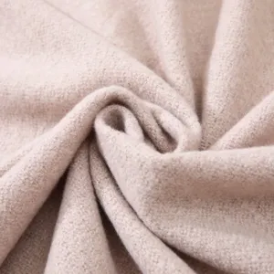 Detailed close-up showing the soft textured fabric of the solid color imitation cashmere scarf.