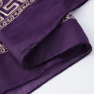 Close-up detail of purple embroidered cotton linen scarf shawl, showing exquisite border stitch.