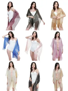 Metallic fringe shawl and shimmering beach cover-up details, lightweight evening wrap.