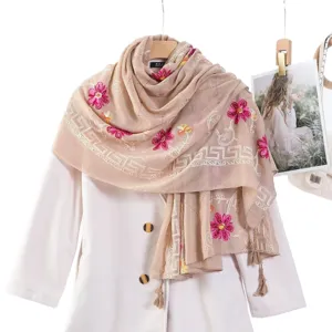 Floral embroidered cotton linen scarf shawl with tassels, elegant beige travel head wrap accessory.