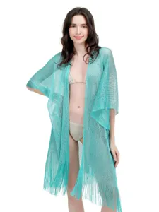 Shimmering metallic mesh beach cover-up shawl with fringe, elegant open-front design.