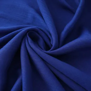 Detailed view of the royal blue slub long scarf fabric, showing soft texture and cozy wear.