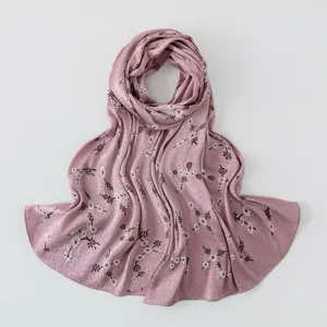 Elegant pink floral print crinkled silk feel long scarf fashion women hijab shawl detail.