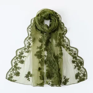 Close-up of olive green lace embroidery details, elegant floral pattern, vintage design scarf.