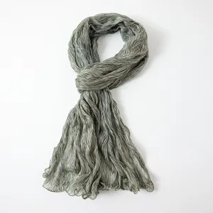 Detailed view of women elegant grey crinkled striped metallic lightweight sheer scarf shawl.