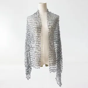 Silver sequin tassel shawl detail, elegant evening party and dress matching accessory.