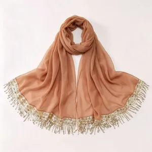 Elegant women chiffon hijab scarf with shimmering gold sequins and delicate fringe tassels.