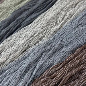Detailed close-up shot showing pleated metallic bubble crepe sheer fabric texture in multi colors.