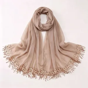 Chiffon sequin tassel hijab scarf in light khaki, delicate sparkling edge detail.