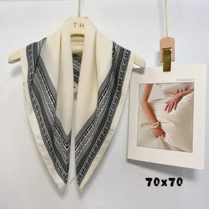 Detail view of the elegant women's paisley printed imitation silk square scarf, perfect styling.
