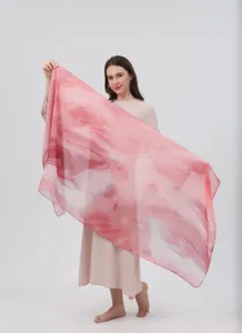 Gradient watercolor silk scarf detail, elegant pink women shawl, soft fabric drape display.