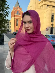 Lightweight magenta bubble scarf, soft travel shawl for sun protection and stylish daily wear.