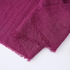 Solid color bubble shawl scarf, lightweight crinkled fabric with frayed edge, purple.