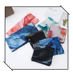Detail view of colorful watercolor gradient print women fashion scarves and shawls collection.