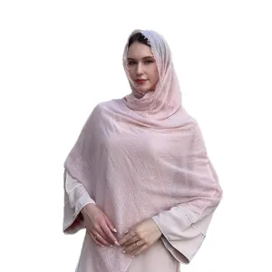 Solid color bubble hijab and lightweight travel shawl for women, elegant pink sun protection scarf.