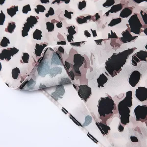 Exquisite watercolor tie-dye leopard print satin polyester scarf soft fabric detail view.