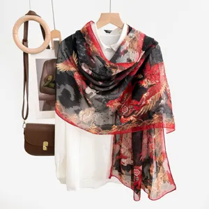Detailed view of a Chinese style printed women's silk scarf shawl, elegant black red design.