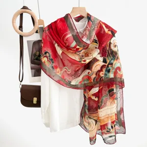 Detailed view of traditional Chinese style red printed women's sun protection scarf shawl.